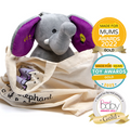 Jaspar The Dreamy Elephant sat in branded tote bag with Gold Award icons to the right